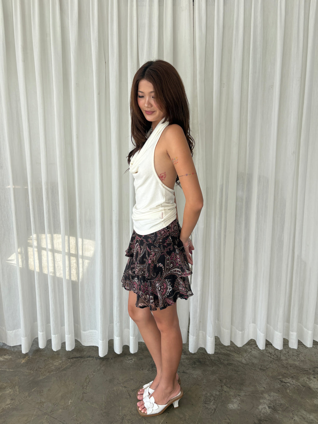 Black paisley ruffle mini skirt